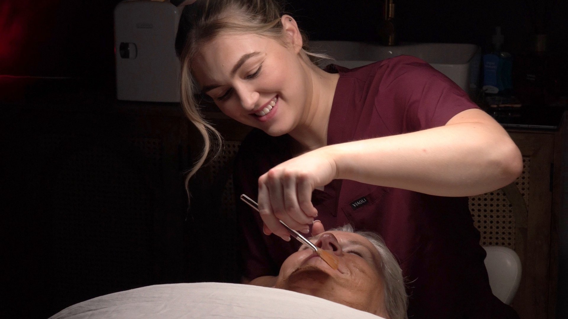 Therapist performing a facial at The Skin Edit Co, Ipswich